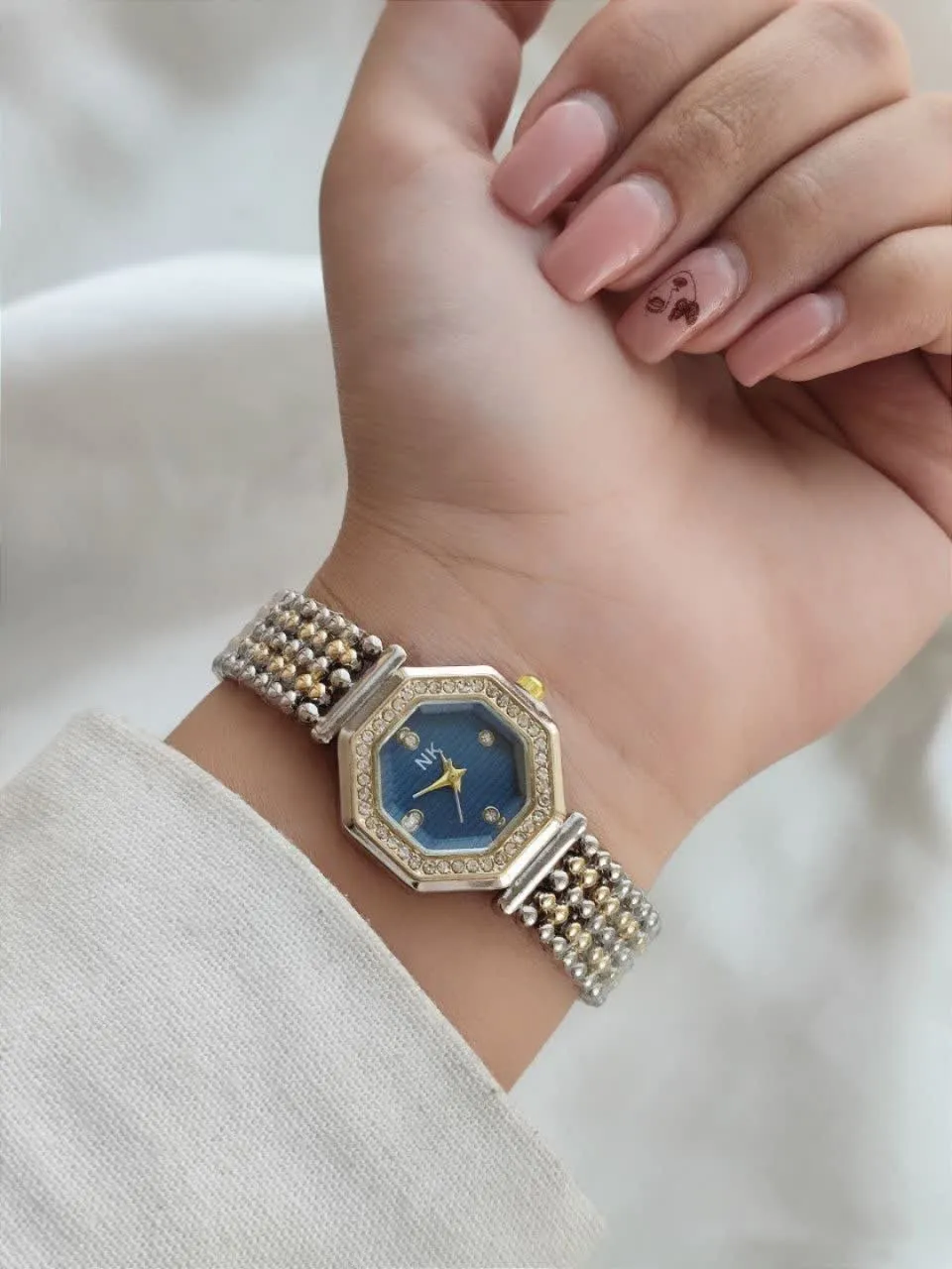 ساعت هشت ظلعی بند مرواریدی صفحه آبی