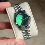 ساعت نقره ای صفحه سبز